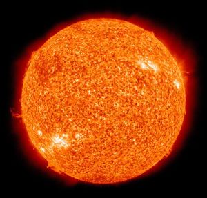 a red sun with black background