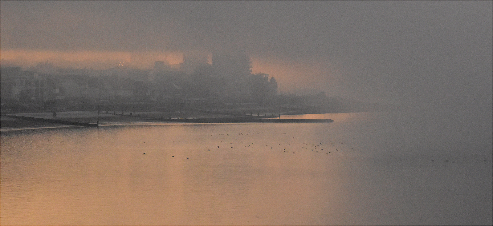 Photo of a lake in fog