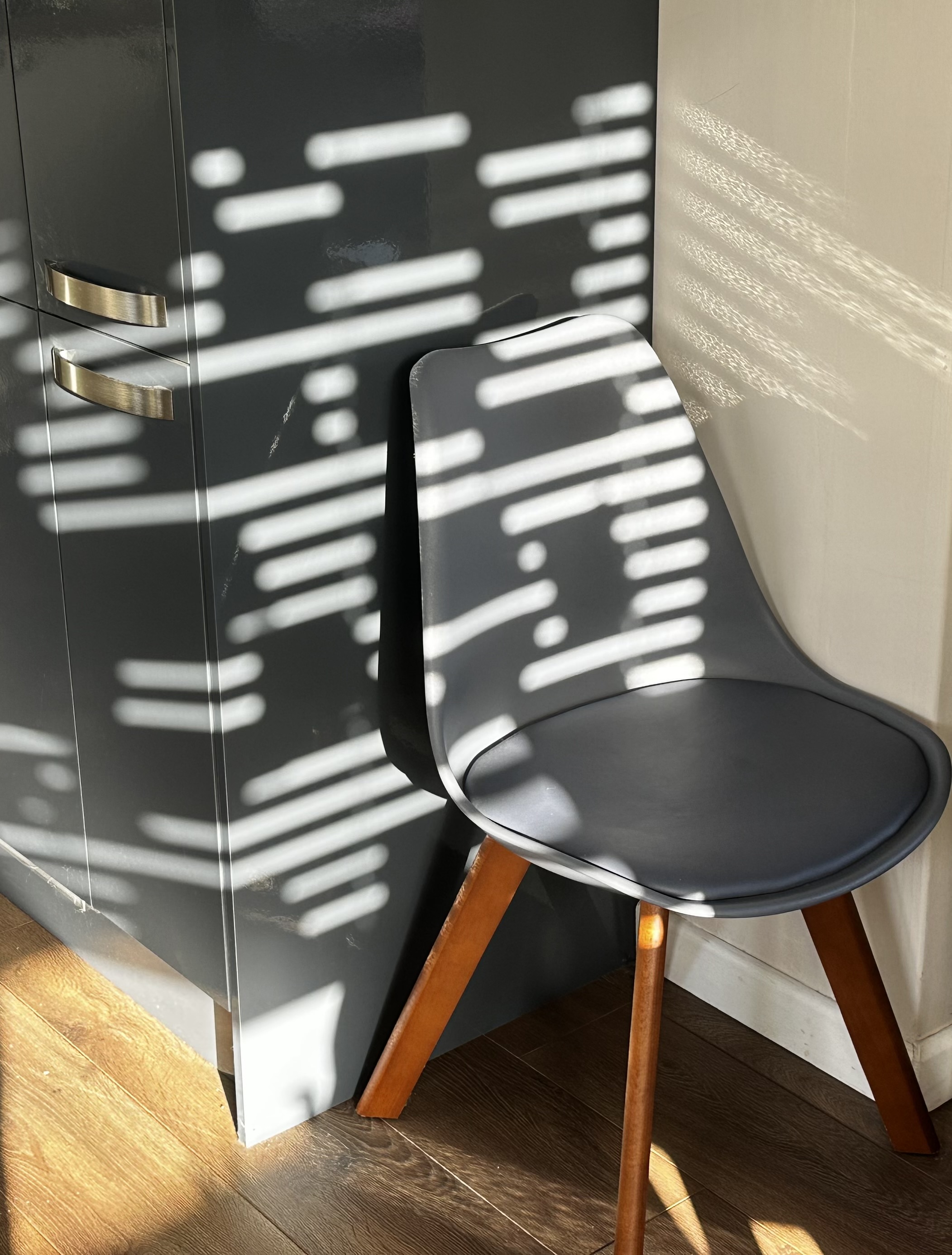 Photo of sunlight falling onto a chair