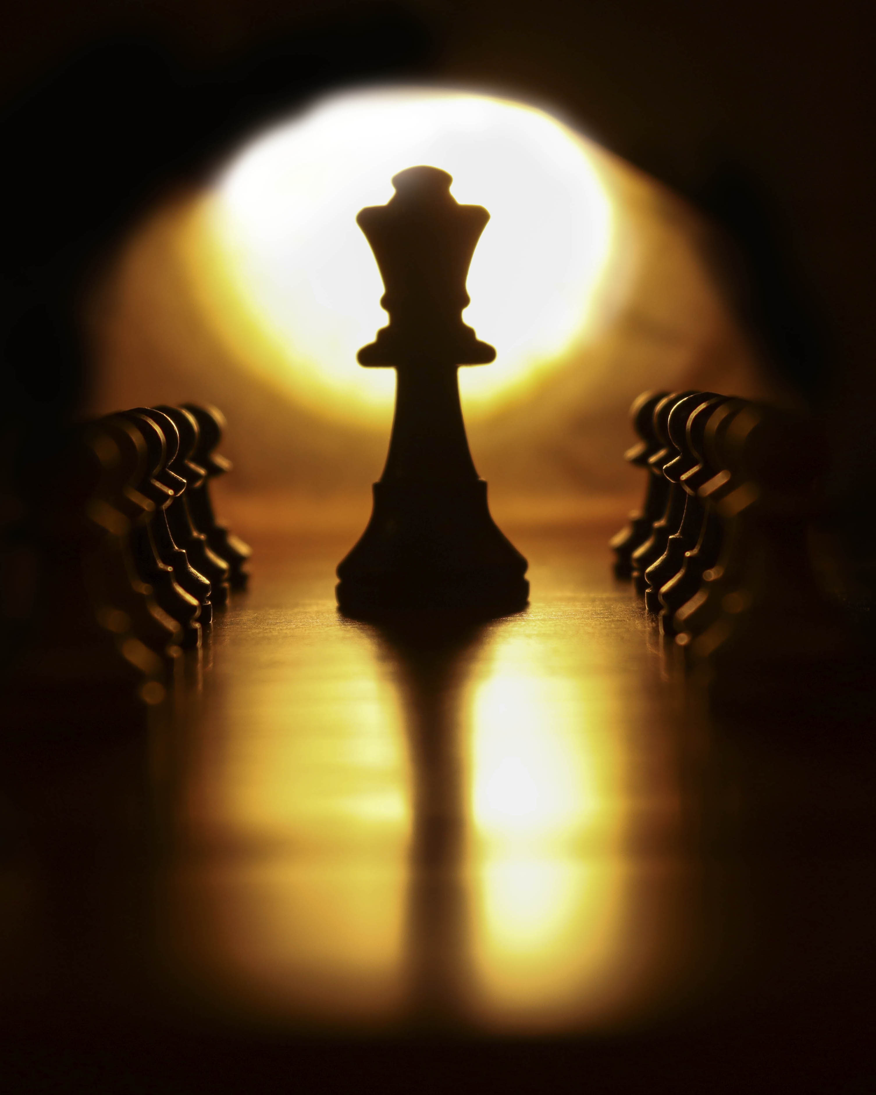 Photo of an illuminated king chess piece