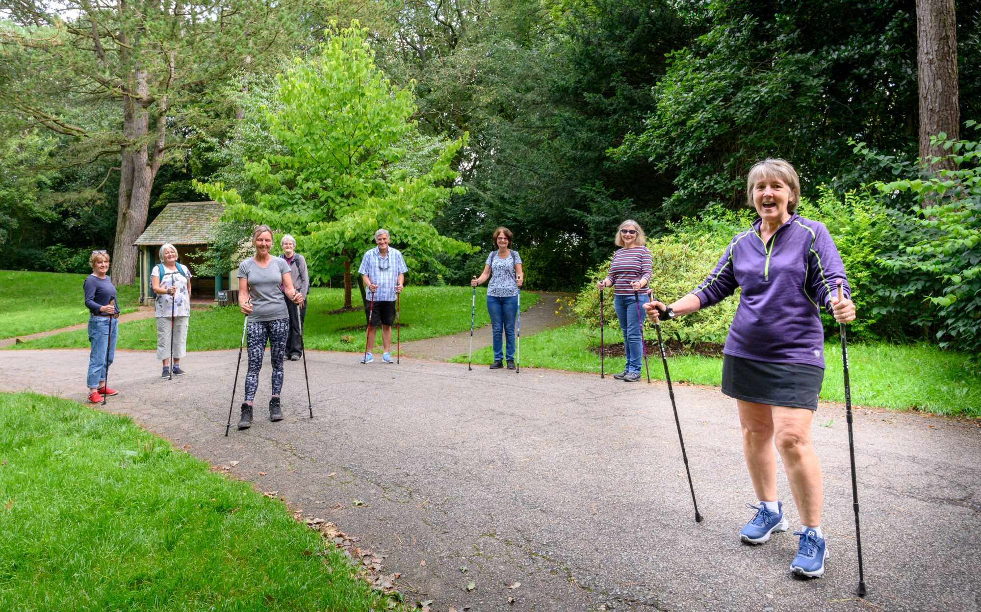 u3a members in a park with walking poles
