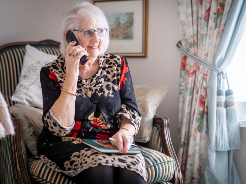woman using a landline image
