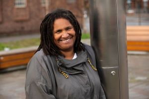 A woman smiling